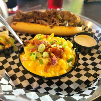 Rogers Roundhouse - Cheesesteak with macaroni and cheese - Beer Gardens Near Me - Fort Worth, Texas