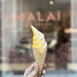 Malai - Vegan Mango and Cardamom Yogurt Soft Serve Swirl (~$6) on Waffle Cone (+$2)
