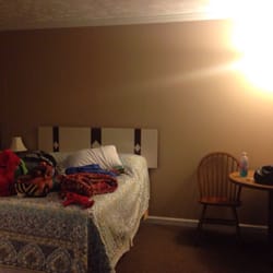 Manistee Crossing Family Resort - Simple, clean room with two doubles. Large mini fridge, wall mounted tv with dish & microwave.
