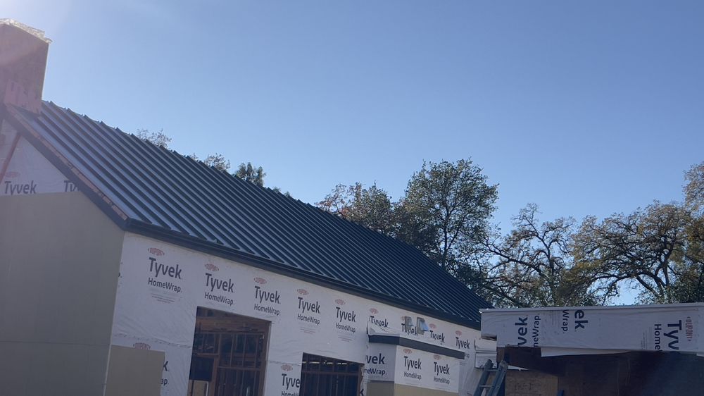 Slide of Berlins Roofing & Gutters