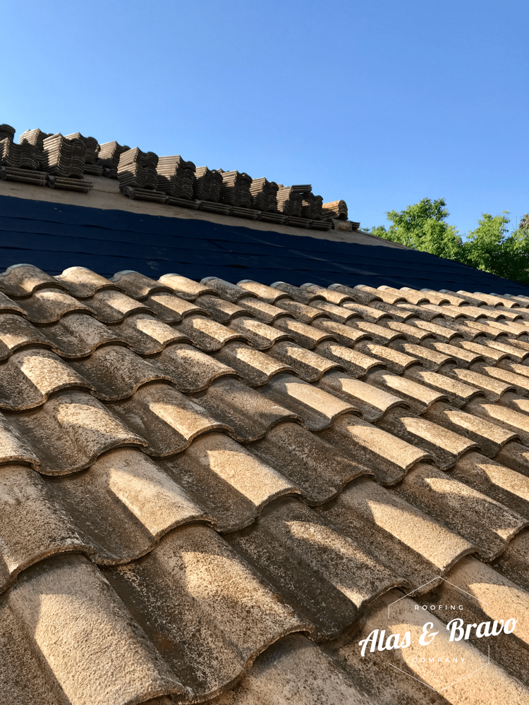 Slide of Alas & Bravo Roofing Company