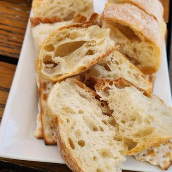 Prost Wine Bar and Charcuterie - Bread served with charcuterie platter - Wine Bars Near Me - Frankenmuth, Michigan