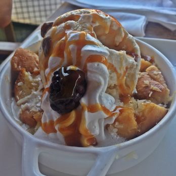 Skipper's Dockside - Coconut Bread Pudding w/ Rum Raisin Ice Cream - Seafood Near Me - Key Largo, Florida Skipper's Dockside - Coconut Bread Pudding w/ Rum Raisin Ice Cream - Seafood Near Me - Key Largo, Florida