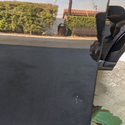 Driver's side door of LR-4 before and after 8/24/20!  So, glad I went this route.  Bill, of Dent Logic was very professional.  Go, NAVY!