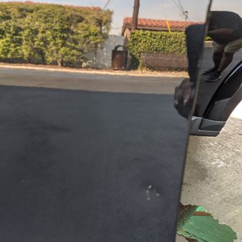 Dent Logic - Driver's side door of LR-4 before and after 8/24/20!  So, glad I went this route.  Bill, of Dent Logic was very professional.  Go, NAVY! - Body Shops Near Me - Thousand Oaks, California