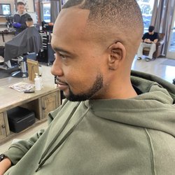Bridge City Barbers - My barber Bennie gave me a bald-fade style cut with moon part on top and i liked it and i like how the way he trimmed my beard too.
