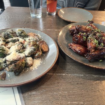 Virtue Feed & Grain - Brussels sprouts and chicken wings - Bars Near Me - Alexandria, Virginia Virtue Feed & Grain - Brussels sprouts and chicken wings - Bars Near Me - Alexandria, Virginia