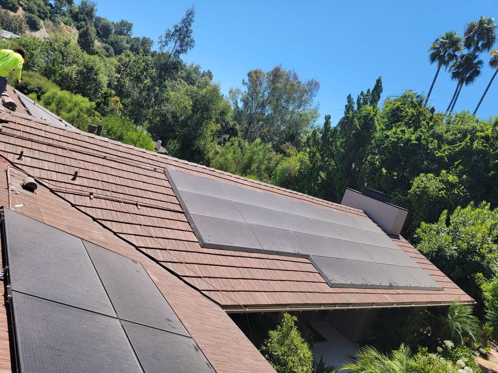 Slide of R Squared Roofing Services