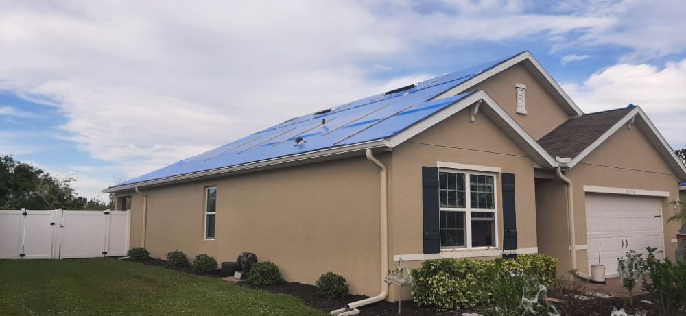 Slide of Lifetime Metal and Tile Roofing