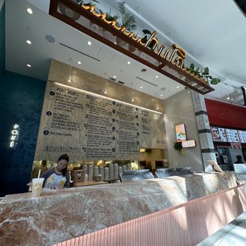Hula Poke - a restaurant counter with a menu on the wall - Poke Near Me - Calgary, Alberta Hula Poke - a restaurant counter with a menu on the wall - Poke Near Me - Calgary, Alberta