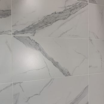 Artisan Stone & Tile - Roger did a great job placing these faux marble tiles! - General Contractors Near Me