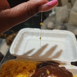 Family Garden Take Out Restaurant - Ordered my food at 6:57pm didn't come until 8pm. Upon opening my food I found this long piece of thread. Smh