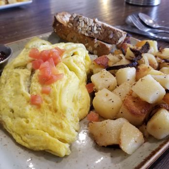 First Watch - The Works omelet with potatoes and toast. - Breakfast & Brunch Near Me - Arlington, Texas