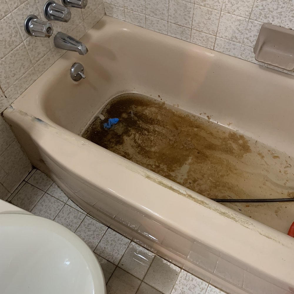 Levine & Sons Plumbing, Heating & AC - How the tub was left after tech "cleaned up" - Heating & Air Conditioning/HVAC Near Me - Southfield, Michigan