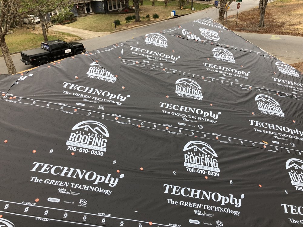 Slide of All About Roofing & Construction