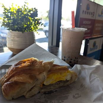 Cafe Tapioca - Sausage egg cheese on a croissant. Couldn't wait to take a bite. - Cafes Near Me - Hercules, California