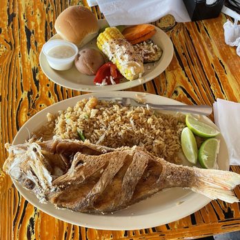 Mambo Seafood - Whole snapper fried, veggies and shrimp rice - Seafood Near Me - Houston, Texas