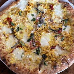 Corn pizza (Seasonal menu ) Corn pizza (Seasonal menu )