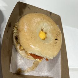 The Riverbend - Bagel breakfast sammie with sausage, added tomato