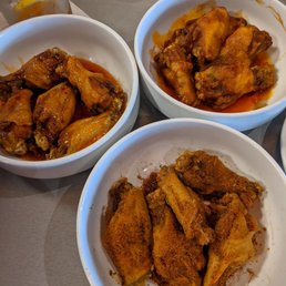 Garlic-Q, Peach Habanero, and Cajun wings Garlic-Q, Peach Habanero, and Cajun wings