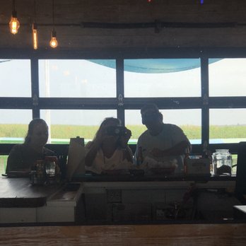 Half Shell Dockside - Cool view of the Apalachicola river in background of the mirror :) - Bars Near Me - Apalachicola, Florida Half Shell Dockside - Cool view of the Apalachicola river in background of the mirror :) - Bars Near Me - Apalachicola, Florida