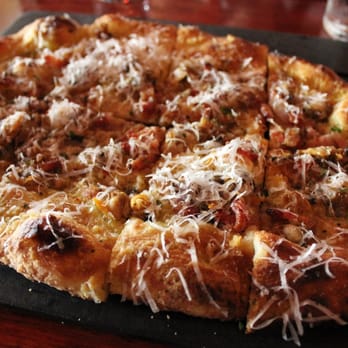 Serious Pie Downtown - penn cove clams, house pancetta, chilies, lemon thyme - Pizza Near Me - Seattle, Washington