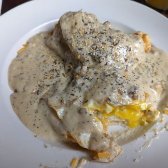 Rowley Inn - Everything but the bagel breakfast (perogies, over easy eggs, kielbasa, sausage gravy) - Pubs Near Me - Cleveland, Ohio