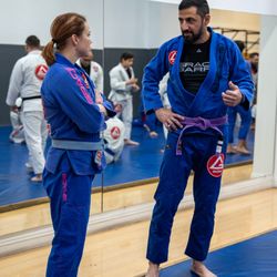 Gracie Barra Brazilian Jiu Jitsu - Drilling partners discussing the technique of the day.