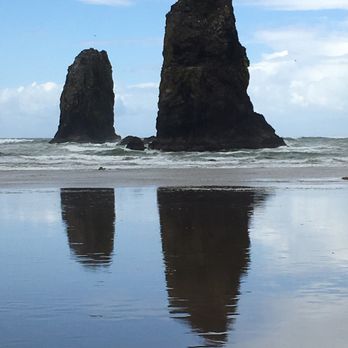 Haystack Rock - The sun came out for long enough to get some blue sky and shadows. Beautiful. - Landmarks & Historical Buildings Near Me - Cannon Beach, Oregon Haystack Rock - The sun came out for long enough to get some blue sky and shadows. Beautiful. - Landmarks & Historical Buildings Near Me - Cannon Beach, Oregon