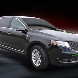 Elite Express - Lincoln MKT Sedan (up to 4 passengers) Large luggage compartment.