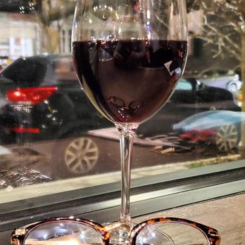 Grisette - a glass of wine and a pair of glasses - French Near Me - Richmond, Virginia Grisette - a glass of wine and a pair of glasses - French Near Me - Richmond, Virginia