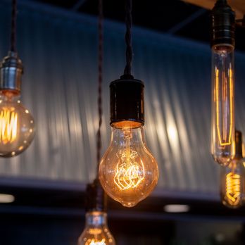 Public House Food + Drink - light bulbs hanging from ceiling - American Near Me - Monroe, Michigan Public House Food + Drink - light bulbs hanging from ceiling - American Near Me - Monroe, Michigan