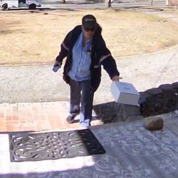 US Post Office - Carrier tosses  package onto the edge of the porch. This was during a 'mail hold' period. Refused to return to pick up package.