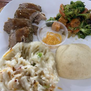Roy's - Pork medallions, roasted veggies, loaded potatoes & roll. Sorry, I had already mixed potatoes. Plate was presented well b4 my mixing! - Sandwiches Near Me - Eastman, Georgia Roy's - Pork medallions, roasted veggies, loaded potatoes & roll. Sorry, I had already mixed potatoes. Plate was presented well b4 my mixing! - Sandwiches Near Me - Eastman, Georgia