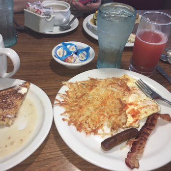 Denny's - French Toast Slugger comes with coffee and hash browns and juice and eggs and bacon and sausage . - Diners Near Me - La Porte, Texas Denny's - French Toast Slugger comes with coffee and hash browns and juice and eggs and bacon and sausage . - Diners Near Me - La Porte, Texas