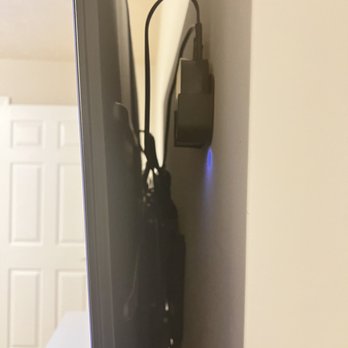 Intact Installs - Organized Apple TV mount + cords behind tv - TV Mounting Near Me Intact Installs - Organized Apple TV mount + cords behind tv - TV Mounting Near Me