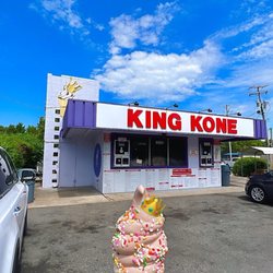 King Kone - Small chocolate ice cream in cone with rainbow sprinkles