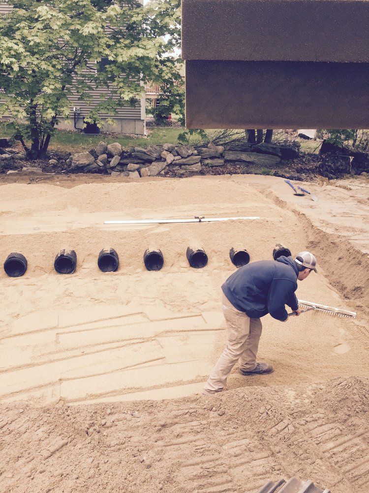 Slide of EmRay Excavating