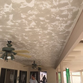 Pro Finish Drywall - New Hawk and Trowel texture in this patio ceiling after repairing numerous cracks - Drywall Installation & Repair Near Me
