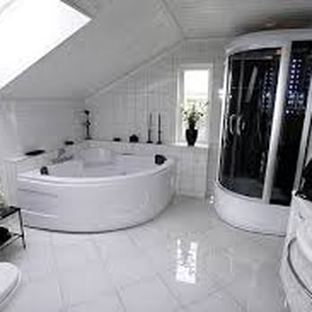 Chad King's Plumbing - a bathroom with a large tub - Plumbing Near Me - Tickfaw, Louisiana Chad King's Plumbing - a bathroom with a large tub - Plumbing Near Me - Tickfaw, Louisiana