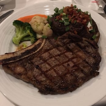 Stockman's Steakhouse - Bone-In Ribeye with Baked Potatoe - Steakhouses Near Me - Laughlin, Nevada Stockman's Steakhouse - Bone-In Ribeye with Baked Potatoe - Steakhouses Near Me - Laughlin, Nevada