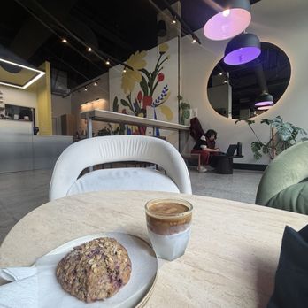 Story Coffee & Tea - raspberry oat scone & coconut espresso in a chilled glass - Coffee & Tea Near Me - Bellevue, Washington Story Coffee & Tea - raspberry oat scone & coconut espresso in a chilled glass - Coffee & Tea Near Me - Bellevue, Washington