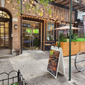 Next Stop Vegan - Outside, small eating area to the right. - Vegan Near Me - Brooklyn, New York