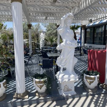 The Mad Greek - Outside seating. Nice when the temperature is under 86 degrees. - Greek Near Me - Baker, California The Mad Greek - Outside seating. Nice when the temperature is under 86 degrees. - Greek Near Me - Baker, California