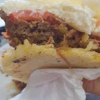 Eparepa Doral - Arepa with shredded beef, tomatoe, cheese, and house sauce. - Chicken Wings Near Me - Doral, Florida Eparepa Doral - Arepa with shredded beef, tomatoe, cheese, and house sauce. - Chicken Wings Near Me - Doral, Florida