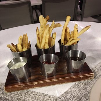 Stripsteak - Awesome pre -appy fries~ truffle oil, herb and Focaccia... - Steakhouses Near Me - Honolulu, Hawaii Stripsteak - Awesome pre -appy fries~ truffle oil, herb and Focaccia... - Steakhouses Near Me - Honolulu, Hawaii