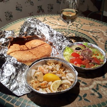 La Manda's Restaurant - Takeout dinner from top left Garlic Pizza Bread, House Salad, Seafood Salad - Italian Near Me - White Plains, New York