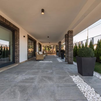 Carmel Custom Stone Care - a patio with a view of the back yard - Flooring Near Me - Carmel, California Carmel Custom Stone Care - a patio with a view of the back yard - Flooring Near Me - Carmel, California