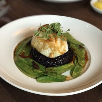 Seasons 52 - Chilean sea bass with black rice and snap peas - New American Near Me - Troy, Michigan