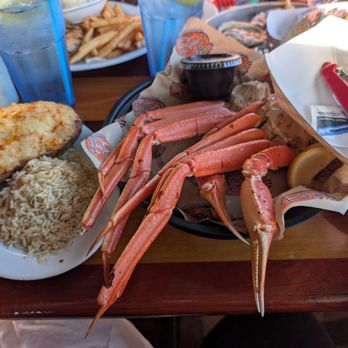 The Back Porch - Snow crabs with potato and rice - Seafood Near Me - Destin, Florida The Back Porch - Snow crabs with potato and rice - Seafood Near Me - Destin, Florida